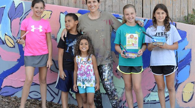 Residents, muralist bring color to city right-of-way