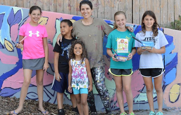 Residents, muralist bring color to city right-of-way