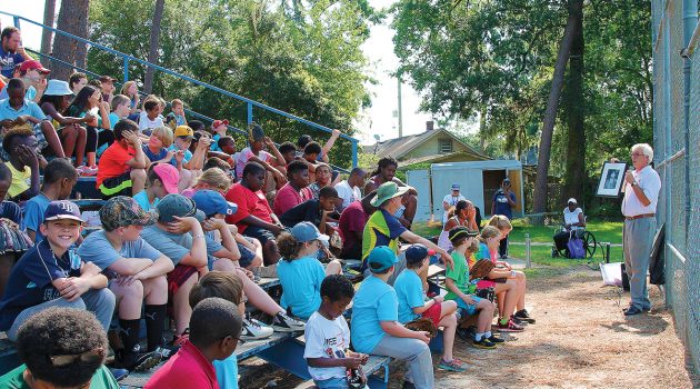 Mentors return to teach baseball, grow mission