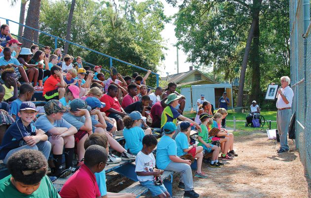 Mentors return to teach baseball, grow mission