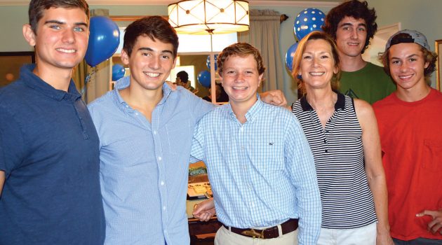 Neighbors gather to toast college-bound entrepreneurs