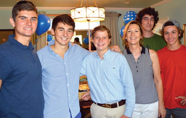 Neighbors gather to toast college-bound entrepreneurs