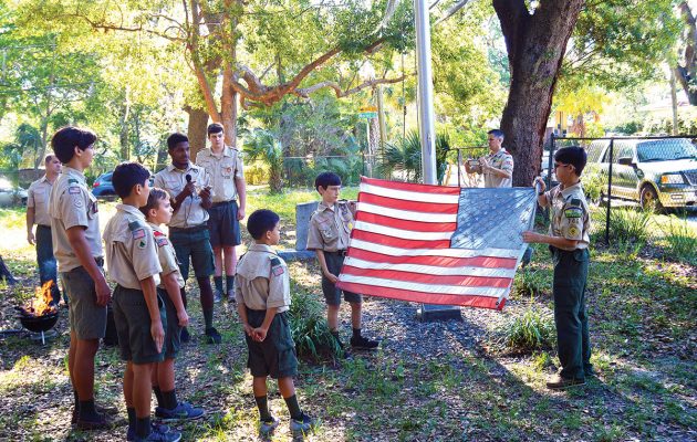Boy Scouts retire old flag in Historic St. Nicholas Cemetery Boy Scouts retire old flag in Historic St. Nicholas Cemetery