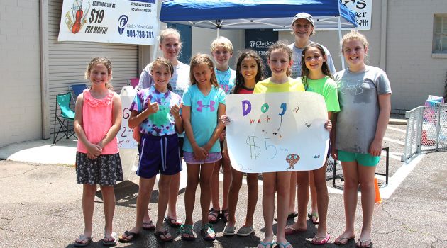 Scouts scrub down furry friends for Jax Dog Café