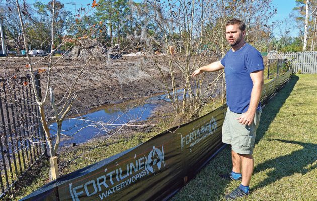 Residents threaten lawsuit unless drainage issue fixed