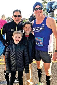 Stella and Reed Krueger with their parents, Michelle and Dean, who both ran in the Gate River Run.