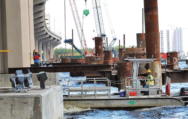 FDOT crews work on land, water for highway improvements