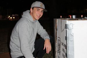 Cooper Hayman, a sophomore at Episcopal School of Jacksonville and a member of Southside Methodist Church, constructs an igloo as his temporary cardboard home. “This is a good way to raise awareness about the homeless,” he said.