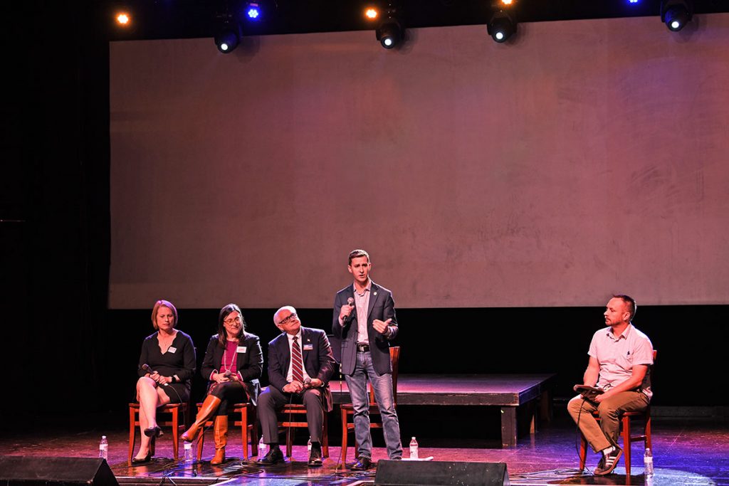 Jimmy Peluso answers a question at the Murray Hill Preservation Association-sponsored forum while Randy DeFoor,  Sunny Gettinger and Henry Mooneyhan wait for moderator Jason Tetlak, right, to lob more questions their way.