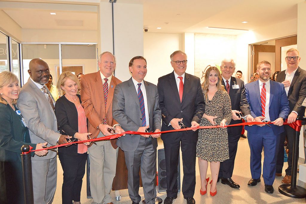 Cutting the ribbon to celebrate the new Walgreens Pharmacy at Baptist MD Anderson Cancer Center were Baptist MD Anderson Administrator LeeAnn Mengel, At-Large Group 5 City Councilman Samuel Newby, Katie Lestan of Walgreens, City Council President Aaron Bowman, Mayor Lenny Curry, Baptist Health President and CEO Hugh Greene, Sydney L. Beliles, PharmD., Walgreens Clinic Manager; Baptist MD Anderson Medical Director Dr. Bill Putnam, Jon Reitz, Walgreens regional vice president; Thomas Isbon, PharmD., Walgreens Healthcare Specialty supervisor
