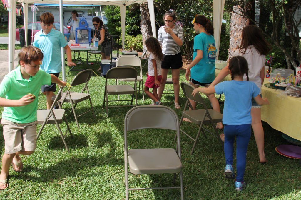 Children participate in a cake walk at Easter Eggstravaganza at Holy Trinity Anglican Church, April 13.