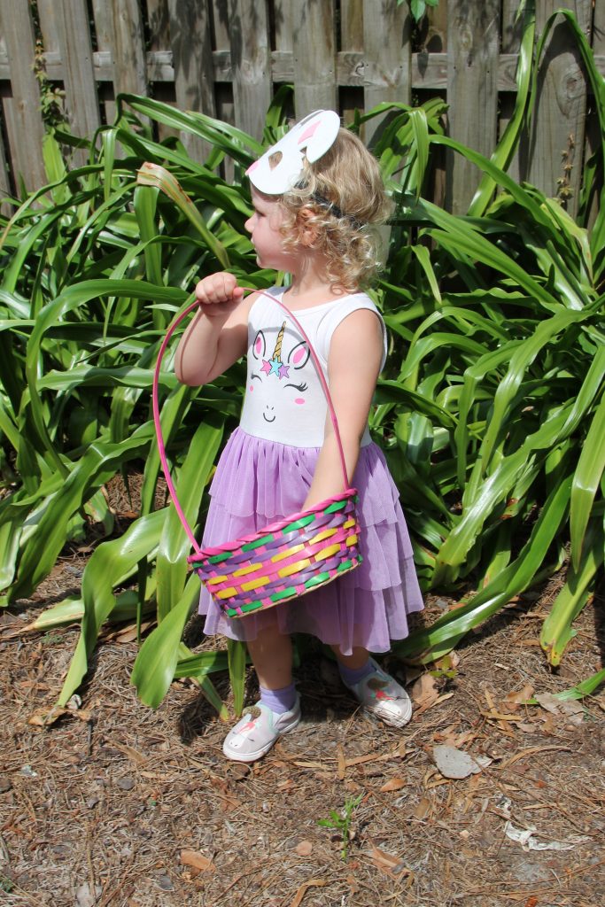 This little princess looks for eggs during the Easter Eggstravaganza at Holy Trinity Anglican Church in Avondale, April 13.