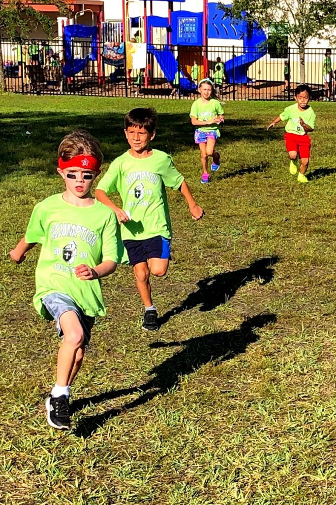 Landon Samuel (front) is followed by Thaddeus Mochowski