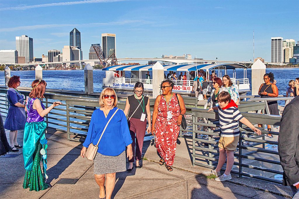 Arts Conference participants enjoyed a water taxi ride from the Hyatt Riverfront Hotel downtown to the Cummer Museum of Art and Gardens, where they were greeted by students in costume from LaVilla School for the Arts. ( Photo courtesy of laird/blac palm inc.)