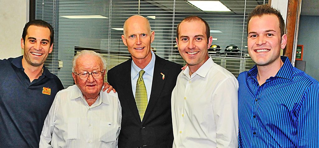 Harry Frisch with Governor Rick Scott and his grandsons, Adam Frisch, Mark Frisch and Steven Frisch.
