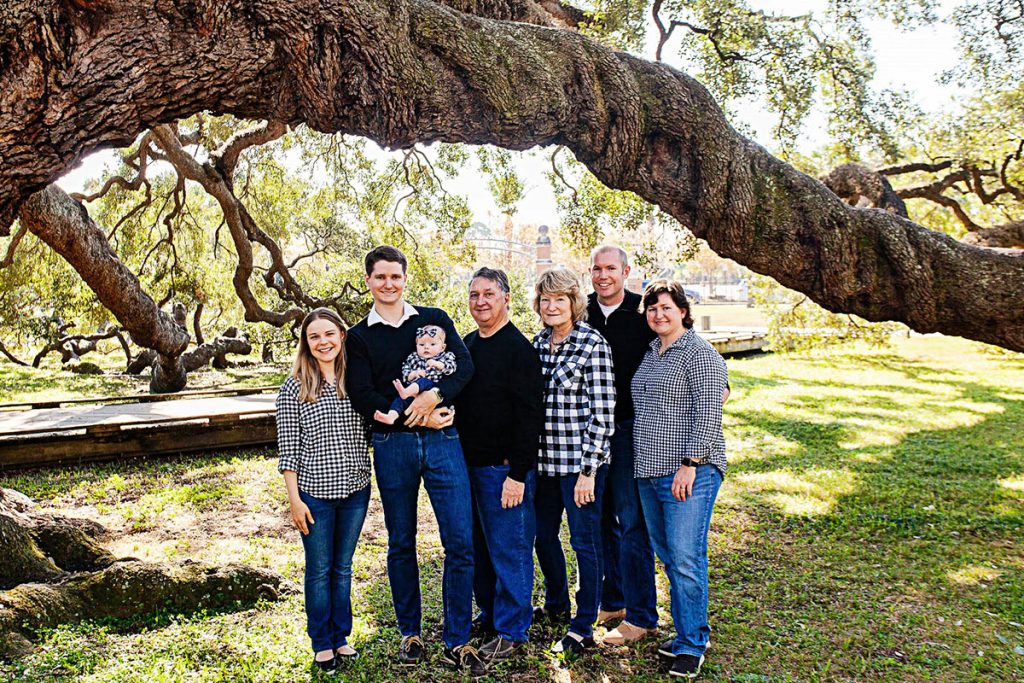 Carole Poindexter’s family recently gathered at Treaty Oak Park, which is meaningful because of Poindexter’s love for the stately oak trees of her neighborhood. From left, Katherine, James and Sophie Poindexter, Al and Carole Poindexter, with Paul and Avery Sander.