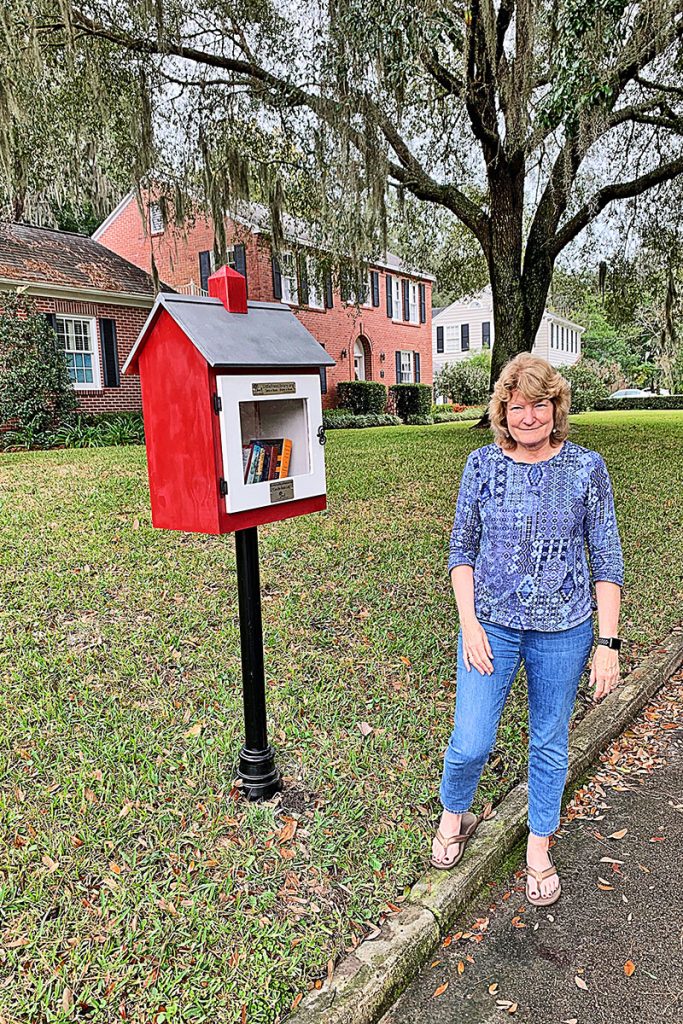 Carole Poindexter’s little library, a part of the national registry of little libraries, where folks can “check-out” books for free, in her front yard.