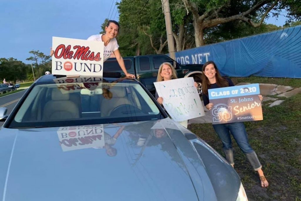 The Robbins family of Avondale – Caroline Robbins, Ivonne Robbins and Jordan Robbins Rechcigl – honored senior Parker Robbins during a drive-by event at St. Johns Country Day School April 20.