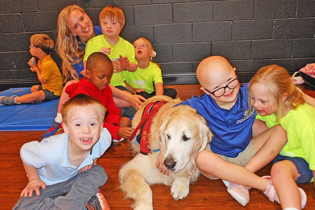 NFSSE students including Presley Harvey, right, with ZenBowie during PE class.