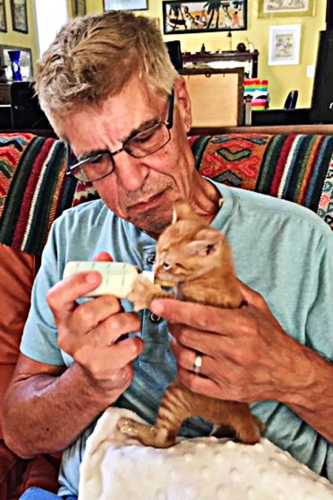 Juan Vegega bottle feeds Ryder