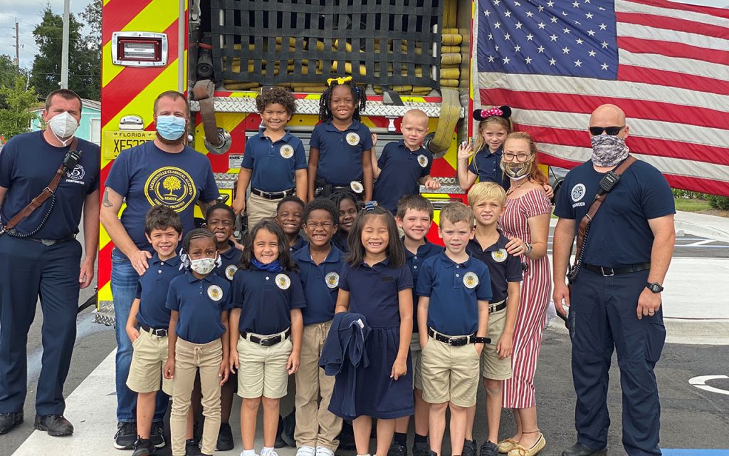 Students at Jacksonville Classical Academy enjoy a visit from the Jacksonville Fire and Rescue squad