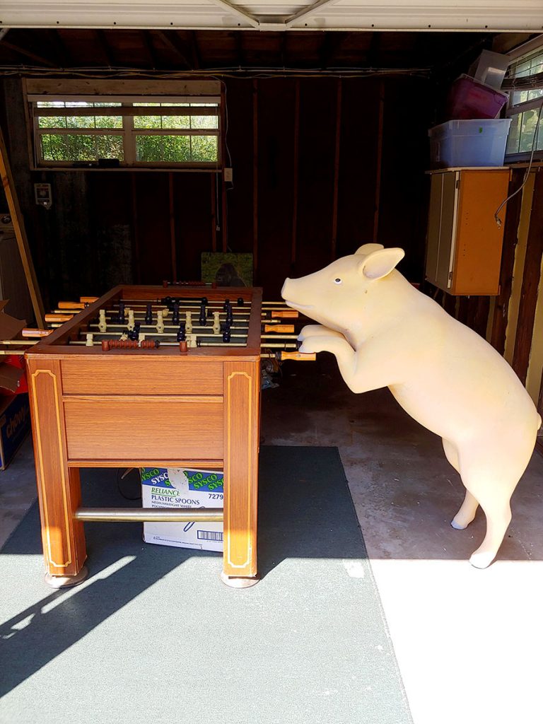 Winston doing his best at Foosball