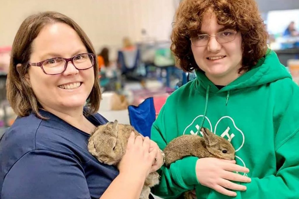 Rabbiteer Club Leader Leslie Hettick & her son Andrew with their rabbits