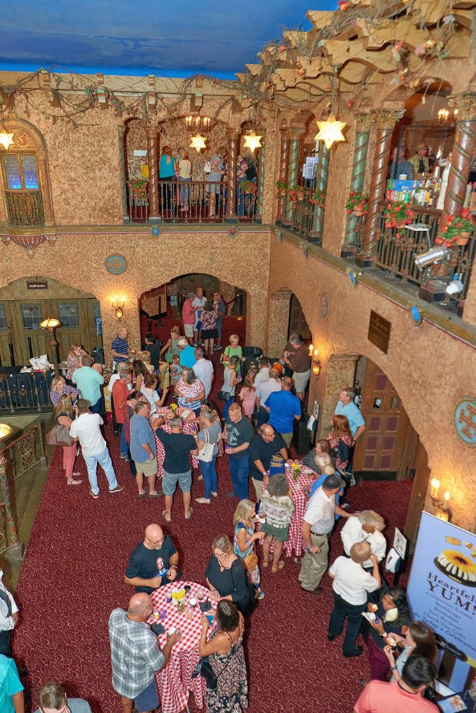 Guests enjoying BBQ, brews and sweets.