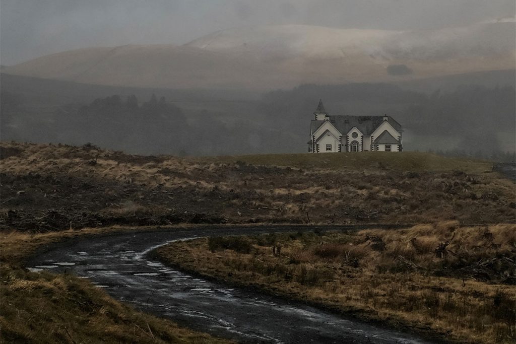 House with gloomy sky