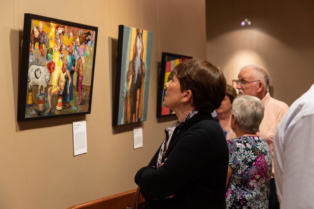 The local community participates regularly in art exhibit openings in our Narthex Gallery.