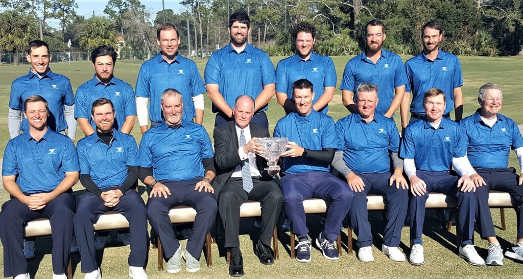 2022 winning Underwood Cup amateur team; Clayton Bromberg of Underwood Jewelers holds Underwood Cup with captain Steve Carter seated to his left. [photo credit to Northern Chapter PGA/JAGA]