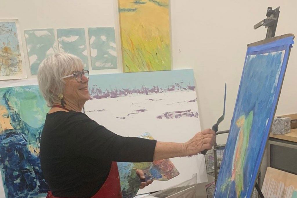 Artist Mimi Sherman Pearce works on her “Funky Duck with Pearls.” Photo courtesy of Jim and Mimi Sherman Pearce.