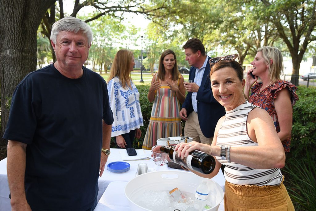 Matt Carlucci is helped to a generous pour by Anita Morrill