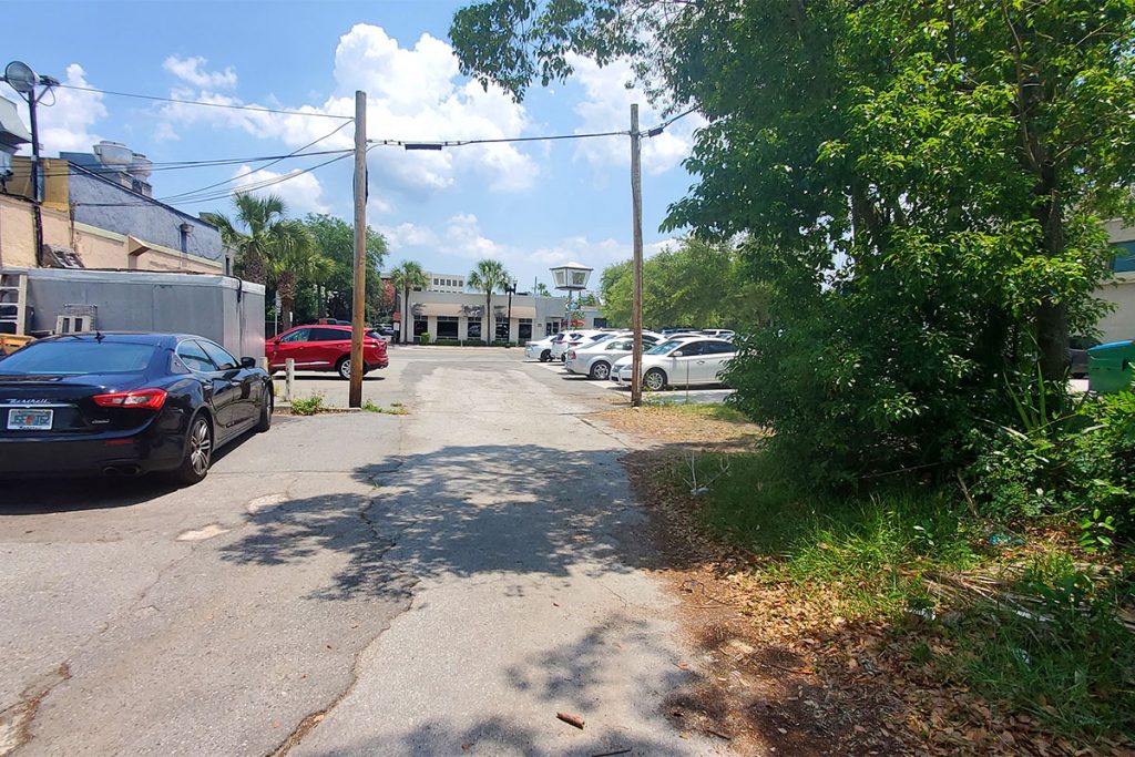 The parking lot next to vacant site and across Hendricks Ave restaurant bb's