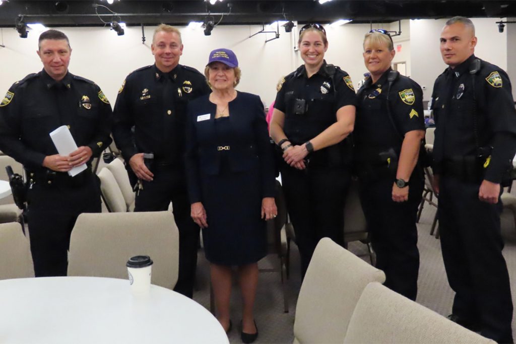Following the Heroes of D-Day presentation, police and community heroes were recognized. Pictured from the Jacksonville Sheriff’s Office are Assistant Chief Josh Benoit, Assistant Chief Chris King, We Can Be Heroes Foundation President Beth Heath, 2021 Police Officer of the Year Jean Kleber, Officer Hartt and 2021 Corrections Officer of the Year Edwin Rivera