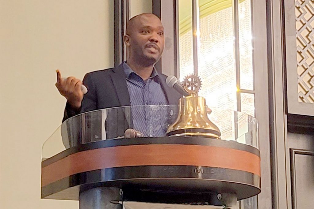 Dr. Jean Claude Niyonzima speaks at the Sept. 26 meeting for the Rotary Club of Jacksonville. Photo by Michele Leivas.