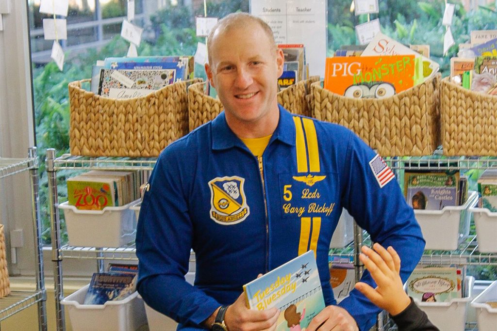 Commander Cary Rickoff read the book “Tuesday Bluesday,” and answered questions from the class.