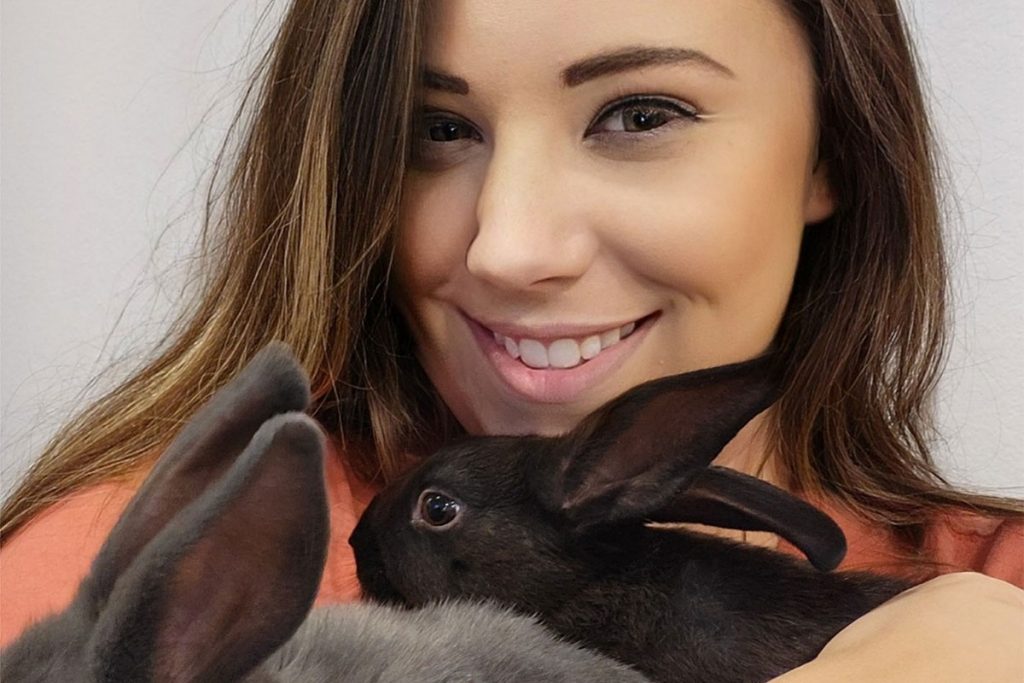 McMann & two 6-month-olds: Bluey, a retired therapy bunny, loves to be held, and Bingo loves cuddles.