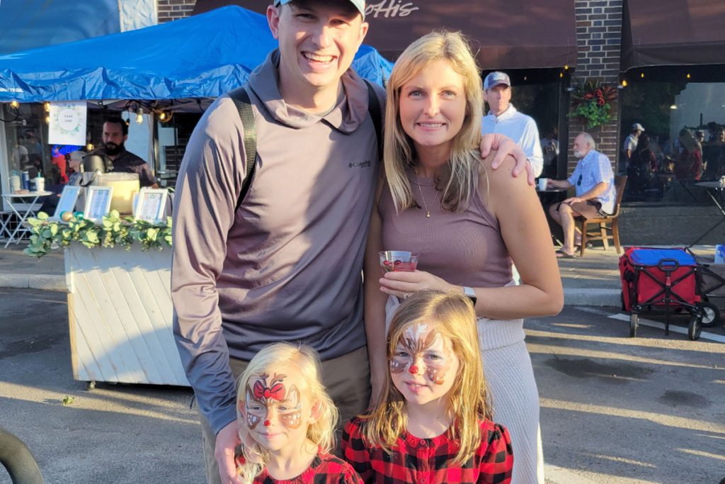 The Sprague Family of St. Johns made sure to stop at the face painting station so their girls could transform into reindeer for the evening.