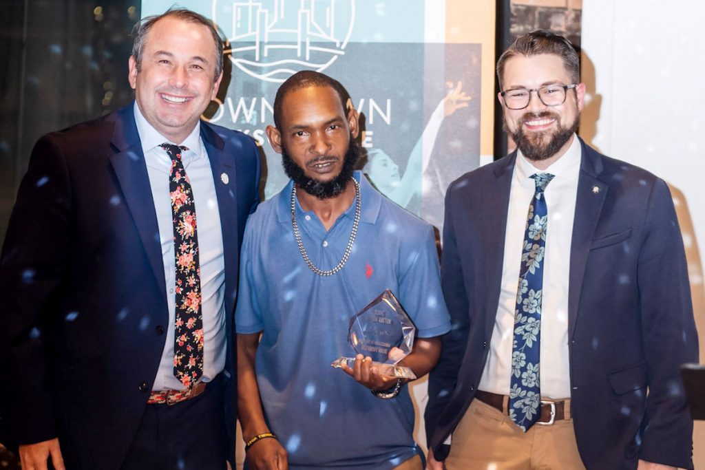 Downtown Ambassador of the Year Duan Thompson (center) with Jake Gordon and Austin Collins