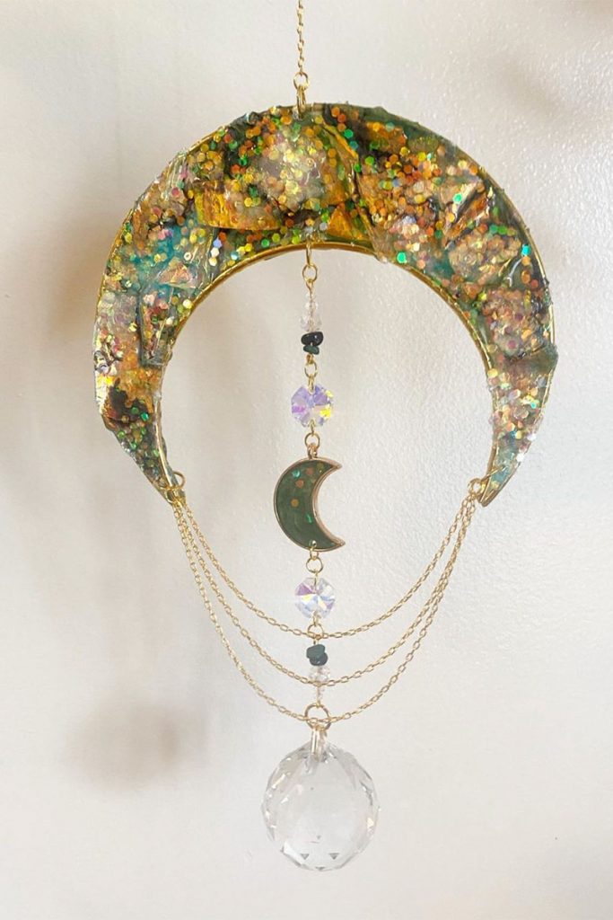 Deep Green Iridescent Moon Suncatcher | Picture Credit: Sparkle Sundream Instagram