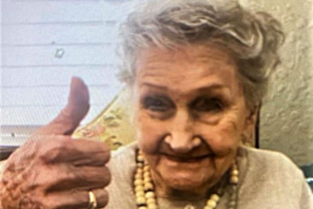 Maxine Meritt Kroll giving thumbs up
