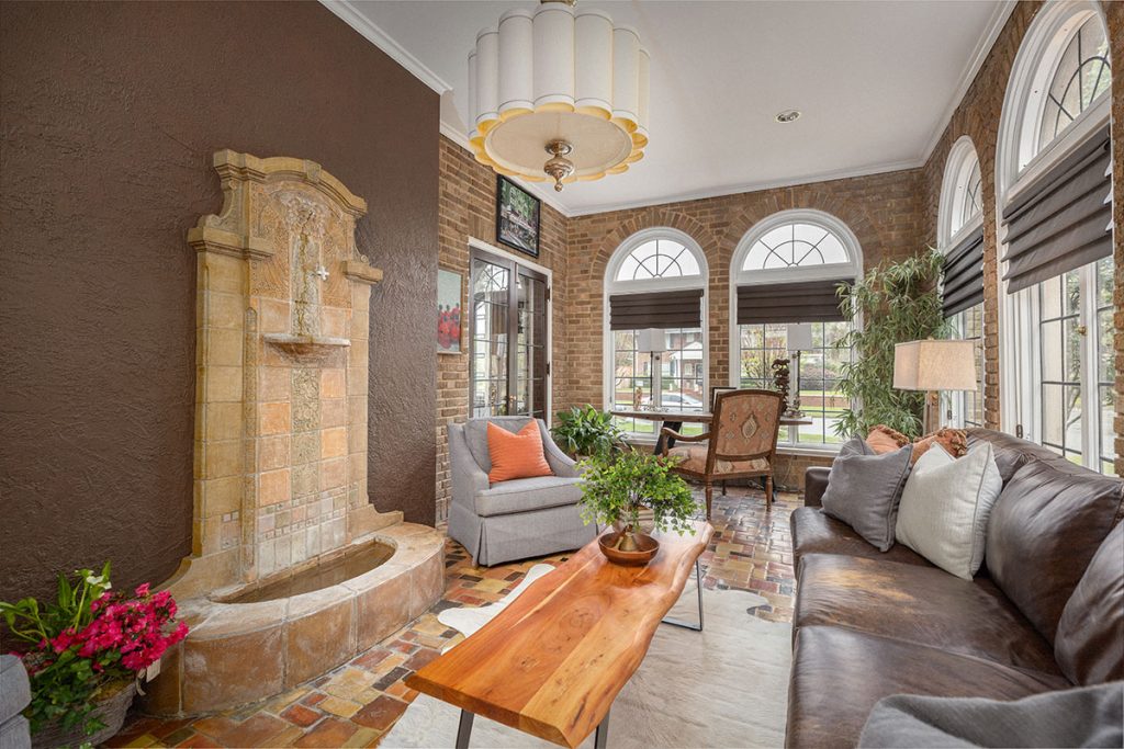 The sunroom of 3404 St. Johns Ave. features an indoor fountain.