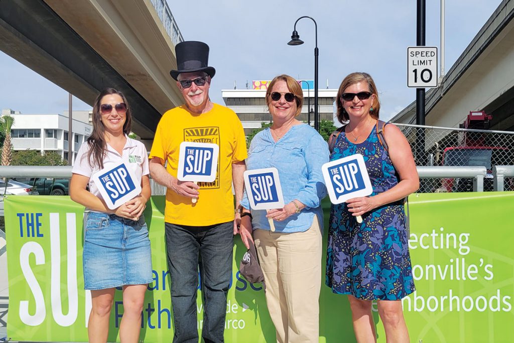 Riverside Avondale Preservation Executive Director Shannon Blankinship, Dr. Wayne Wood, District 14 City Council Member Randy DeFoor and St. Johns Riverkeeper Lisa Rinaman at the community celebration of the opening of the Fuller Warren Shared-Use Path (“The SUP”) on Saturday, April 8.