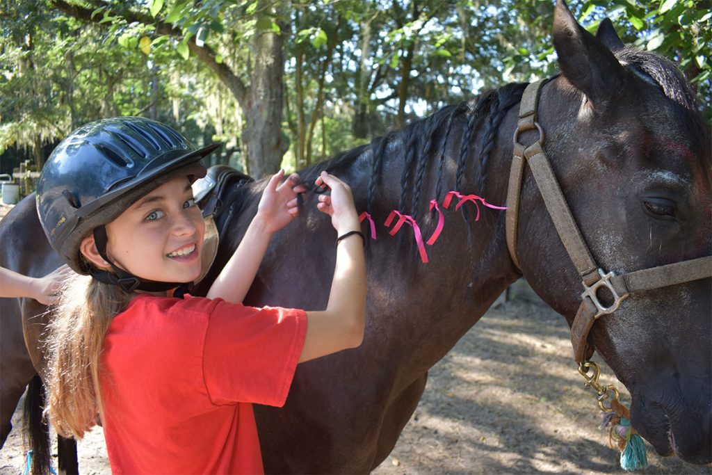 Episcopal girl with horse