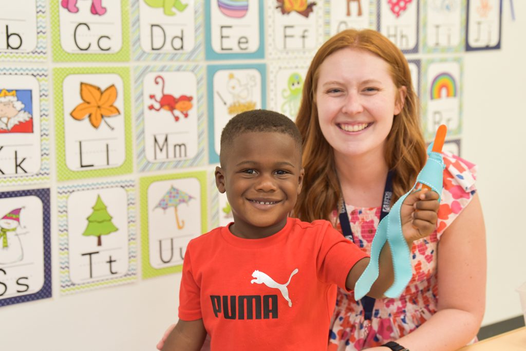 STEAM teacher Maggie Young jumps right into creating with her Pre-K 3 students on the first day at Riverside Presbyterian Day School.