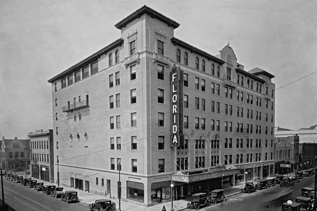 A historical photo shows the vertical blade sign that used to adorn the Florida Theatre, an element hoped to return in future improvements.