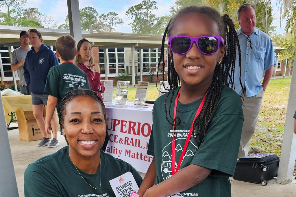 Alexis and Kylie Graham enjoying the pre-Walkathon festivities in the Hendricks Avenue Elementary courtyard.