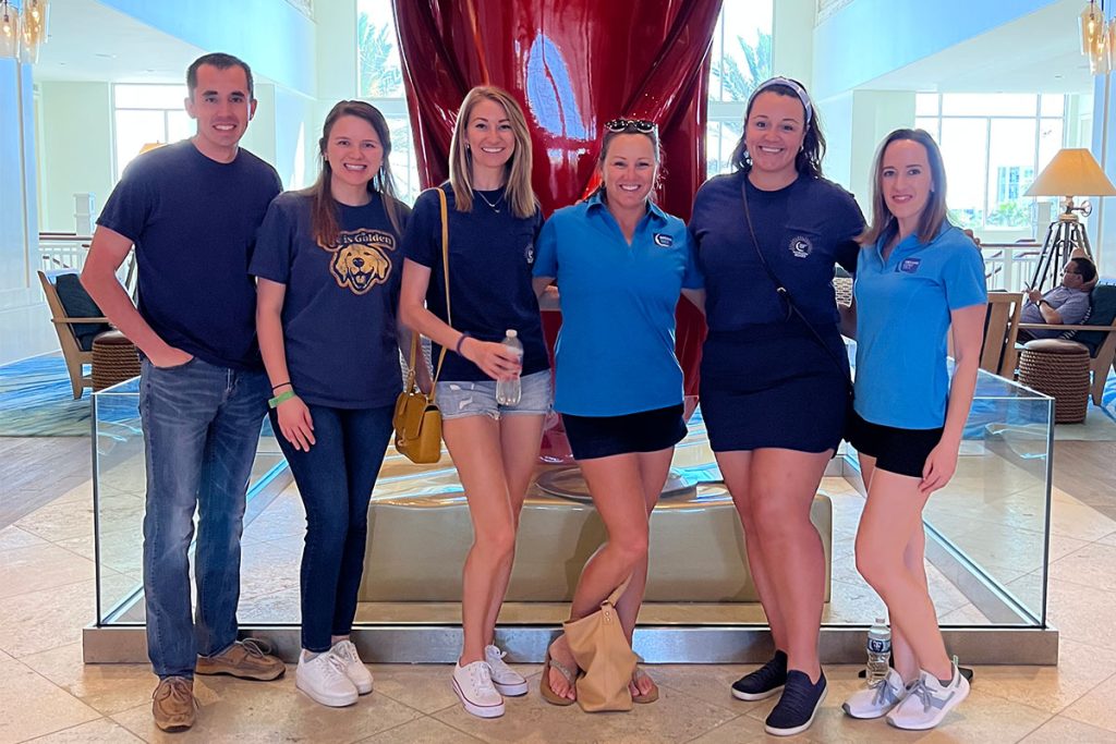 Anna Valent with members of the Dreams Come True Horizon Board on a visit to Give Kids the World.