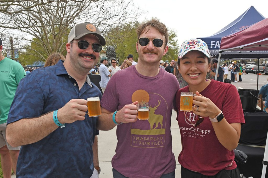 Rhett Roberts and Matt Guza with Natalie Leedy, who represents Historically Hoppy in Springfield.